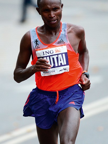 Geoffrey Mutai leads the New York City marathon in November 2013