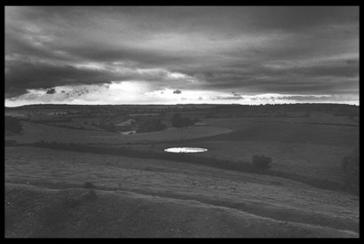 ‘Dew-pond by Iron Age hill fort, Somerset’, 1988, by Don McCullin