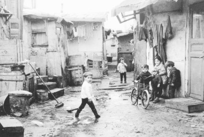 Children in the bidonville du Chemin du Cornillon, Saint-Denis, 1963. (From Luc Sante’s The Other Paris)