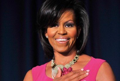 Michelle Obama listens to the National Anthem at the White House Correspondents Association annual dinner in Washington, May 2009